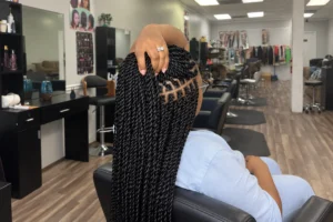 Long Senegalese twists done at Kekem African Braids in Spring, TX