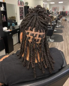 Loc retwist with neat roots and clean parts